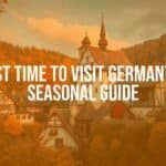 Scenic view of a German castle surrounded by autumn foliage, traditional village in the foreground, warm lighting, realistic.