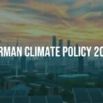 A futuristic German cityscape with wind turbines and solar panels, under a dynamic sky, representing climate policy and energy transition, modern and realistic.