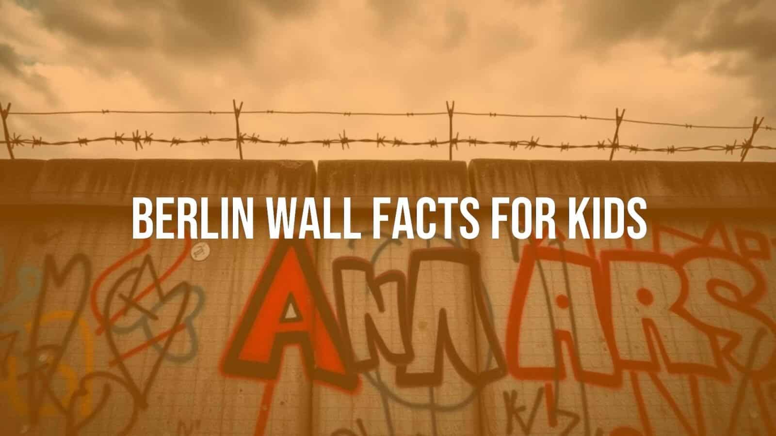 A section of the Berlin Wall with graffiti, barbed wire on top, gloomy sky, historical, realistic.