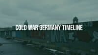 Divided Berlin with the Berlin Wall, Cold War era, contrasting East and West sides, historical tension, realistic style.